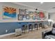 Game room bar with seating and sports memorabilia at 2536 E Wood Pl, Chandler, AZ 85249