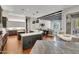 Modern kitchen with large island, stainless steel appliances, and white cabinets at 2536 E Wood Pl, Chandler, AZ 85249