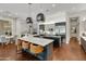 Open concept kitchen with large island and modern fixtures at 2536 E Wood Pl, Chandler, AZ 85249