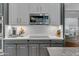 Sleek kitchen with stainless steel appliances and a stylish backsplash at 2536 E Wood Pl, Chandler, AZ 85249