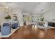 Open living space with hardwood floors and access to the dining area at 2536 E Wood Pl, Chandler, AZ 85249