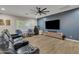 Relaxing media room with a large screen TV and comfortable seating at 2536 E Wood Pl, Chandler, AZ 85249
