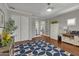 Home office with hardwood floors and built-in shelving at 2536 E Wood Pl, Chandler, AZ 85249