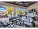 Spacious backyard patio with seating and a built-in grill at 2536 E Wood Pl, Chandler, AZ 85249