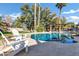 Stunning pool with inviting lounge chairs and a pergola at 2536 E Wood Pl, Chandler, AZ 85249