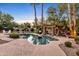 Resort-style backyard with a large pool, spacious patio, and a pergola at 2536 E Wood Pl, Chandler, AZ 85249