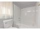 Bathroom with shower/tub combo and white toilet at 2650 W Union Hills Dr # 352, Phoenix, AZ 85027
