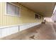 Covered walkway alongside mobile home, providing shade and shelter at 2650 W Union Hills Dr # 352, Phoenix, AZ 85027