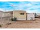 View of the mobile home's exterior, showing the shed and satellite dish at 2650 W Union Hills Dr # 352, Phoenix, AZ 85027