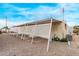 Mobile home with covered patio and lattice privacy screen at 2650 W Union Hills Dr # 352, Phoenix, AZ 85027