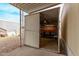 Exterior storage shed with sliding door and shelving at 2650 W Union Hills Dr # 352, Phoenix, AZ 85027