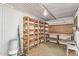 Workshop with wooden shelving and workbench at 2650 W Union Hills Dr # 352, Phoenix, AZ 85027