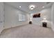 Bedroom with carpet flooring, modern lighting fixture, and modern decor at 32722 N 132Nd Ln, Peoria, AZ 85383
