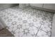 Star patterned tile flooring in a bathroom or powder room at 32722 N 132Nd Ln, Peoria, AZ 85383