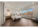Bright main bedroom with mountain views, and decorative lighting at 32722 N 132Nd Ln, Peoria, AZ 85383