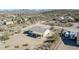 Aerial view of a house and surrounding desert landscape at 3433 W Wander Rd, New River, AZ 85087