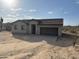 One-story home with attached garage and desert landscaping at 3433 W Wander Rd, New River, AZ 85087