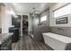 Spa-like bathroom featuring a soaking tub, shower, and vanity at 34949 N Donald Way, San Tan Valley, AZ 85140