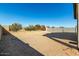 Large backyard with block wall and open space at 40108 W Crane Dr, Maricopa, AZ 85138