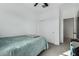 Bedroom with double bed and closet, featuring neutral tones at 40108 W Crane Dr, Maricopa, AZ 85138