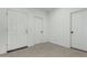 Clean entryway with tiled floors and multiple doors at 40108 W Crane Dr, Maricopa, AZ 85138