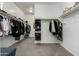 Spacious walk-in closet with ample shelving and hanging space at 40108 W Crane Dr, Maricopa, AZ 85138