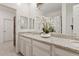 Bright bathroom with double vanity and granite countertops at 4127 W Granite Basin Dr, New River, AZ 85087