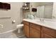 Clean bathroom with single vanity and shower/tub combo at 42127 N Celebration Way, Anthem, AZ 85086