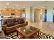 Open kitchen with island and stainless steel appliances at 42127 N Celebration Way, Anthem, AZ 85086