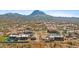 Aerial view of property and surrounding desert landscape, mountain in background at 48412 N 31St Ave, New River, AZ 85087