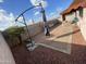 Spacious backyard with patio and shade umbrella at 5128 S 6Th St, Phoenix, AZ 85040