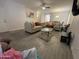 Living room with comfy sofas and a large TV at 5128 S 6Th St, Phoenix, AZ 85040
