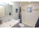 Updated bathroom with bathtub, shower and a large mirror at 615 E Winter Dr, Phoenix, AZ 85020