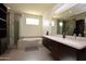 Spa-like bathroom with double vanity and large shower at 615 E Winter Dr, Phoenix, AZ 85020