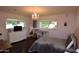 Bright bedroom with hardwood floors and plenty of light at 615 E Winter Dr, Phoenix, AZ 85020