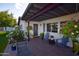Welcoming front porch with hanging baskets and comfortable seating at 615 E Winter Dr, Phoenix, AZ 85020