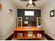 Dedicated home office with built-in shelving and desk at 615 E Winter Dr, Phoenix, AZ 85020