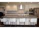 Modern kitchen with large island and stainless steel appliances at 615 E Winter Dr, Phoenix, AZ 85020