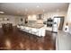 Modern kitchen with large island and stainless steel appliances at 615 E Winter Dr, Phoenix, AZ 85020