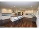 Bright kitchen with white cabinets and hardwood floors at 615 E Winter Dr, Phoenix, AZ 85020