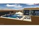 Modern pool and patio design with mountain views at 615 E Winter Dr, Phoenix, AZ 85020
