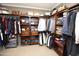 Large walk-in closet with ample shelving and hanging space at 615 E Winter Dr, Phoenix, AZ 85020