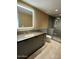 Elegant bathroom with a soaking tub and walk-in shower at 6587 N Palmeraie Blvd # 2022, Paradise Valley, AZ 85253