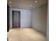 Spacious, light-filled room with neutral walls, tile flooring and ample electrical outlets at 6587 N Palmeraie Blvd # 2022, Paradise Valley, AZ 85253