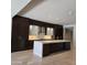 Modern kitchen featuring sleek cabinets, marble countertops, and stainless-steel appliances at 6587 N Palmeraie Blvd # 2022, Paradise Valley, AZ 85253