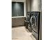 Laundry room with modern washer and dryer set at 6587 N Palmeraie Blvd # 2022, Paradise Valley, AZ 85253