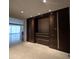 Open living area with built-in storage, recessed lighting, and tile flooring at 6587 N Palmeraie Blvd # 2022, Paradise Valley, AZ 85253