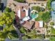Bird's eye view of the home, pool, and surrounding landscape at 6800 E Caballo Dr, Paradise Valley, AZ 85253