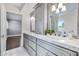 Double vanity bathroom with marble countertops and ample storage at 6800 E Caballo Dr, Paradise Valley, AZ 85253