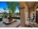 Elegant courtyard entry with fountain, creating a tranquil atmosphere at 6800 E Caballo Dr, Paradise Valley, AZ 85253
